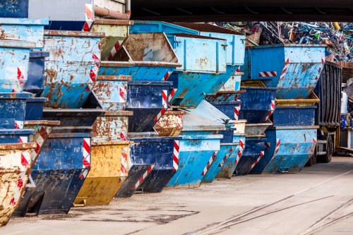 Residents packing old furniture for disposal in Queenspark